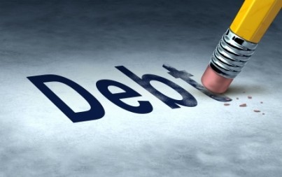 Erasing debt concept with a pencil